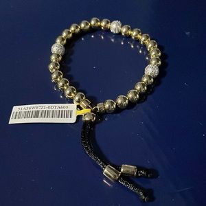 NWT gold and silver tone adjustable bracelet